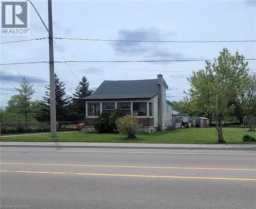 view of the current house that so there should be no lot levies and it is a serviced lot. - 46 Bridge Street E, Kitchener, ON 