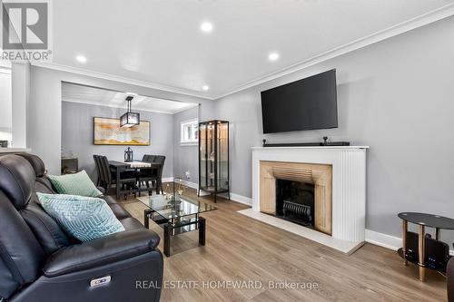 413 O'Connor Drive, Toronto, ON - Indoor Photo Showing Living Room With Fireplace