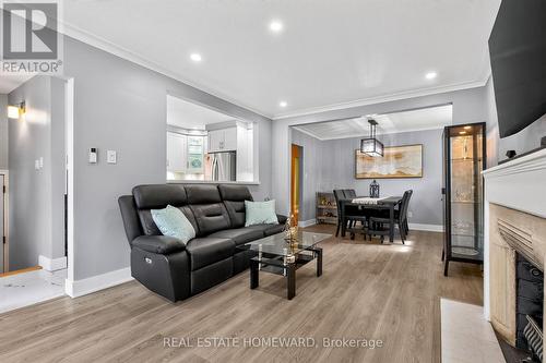 413 O'Connor Drive, Toronto, ON - Indoor Photo Showing Living Room With Fireplace
