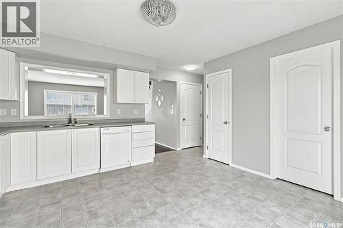 106 663 Beckett Crescent, Saskatoon, SK - Indoor Photo Showing Kitchen With Double Sink