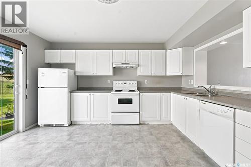 106 663 Beckett Crescent, Saskatoon, SK - Indoor Photo Showing Kitchen With Double Sink