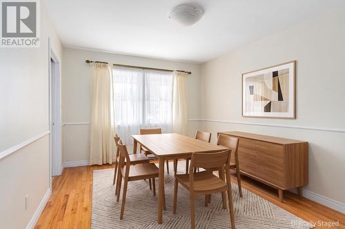 AI Staged - dining room - 10 Tonbridge Place, St. John'S, NL - Indoor Photo Showing Dining Room