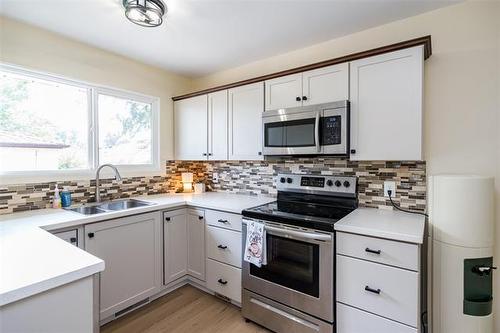 158 Howden Rd, Winnipeg, MB - Indoor Photo Showing Kitchen With Double Sink