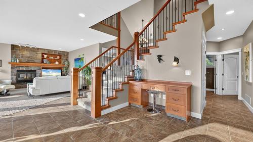 4780 Westridge Drive, Kelowna, BC - Indoor Photo Showing Other Room With Fireplace
