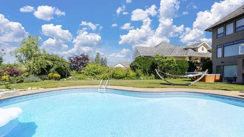 4780 Westridge Drive, Kelowna, BC - Outdoor With In Ground Pool With Backyard