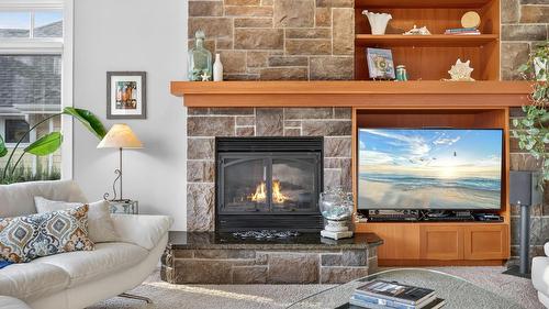 4780 Westridge Drive, Kelowna, BC - Indoor Photo Showing Living Room With Fireplace