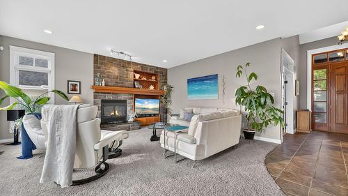 4780 Westridge Drive, Kelowna, BC - Indoor Photo Showing Living Room With Fireplace