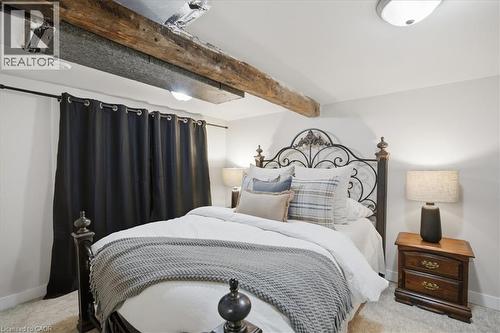 Exposed wood ceiling beam - 22 Delena Avenue N, Hamilton, ON - Indoor Photo Showing Bedroom