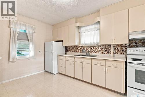 1506 Edward Avenue, Saskatoon, SK - Indoor Photo Showing Kitchen With Double Sink