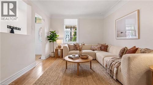 Virtually Staged - 180 West Avenue, Hamilton, ON - Indoor Photo Showing Living Room