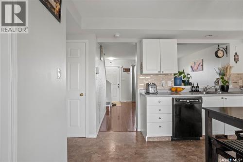 1402 10Th Avenue E, Regina, SK - Indoor Photo Showing Kitchen With Double Sink