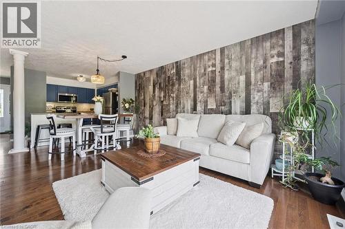 Hardwood-style flooring throughout - 308 Parkvale Drive, Kitchener, ON - Indoor Photo Showing Living Room
