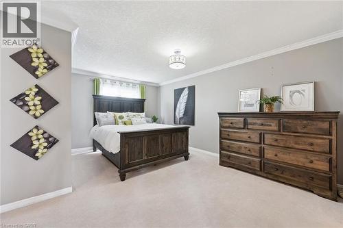 Carpeted flooring, recessed lighting, crown molding, and ample natural light - 308 Parkvale Drive, Kitchener, ON - Indoor Photo Showing Bedroom