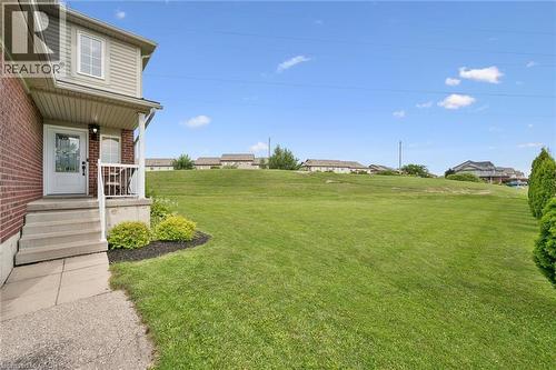 Brick and siding exterior with a covered porch - 308 Parkvale Drive, Kitchener, ON - Outdoor