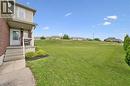 Brick and siding exterior with a covered porch - 308 Parkvale Drive, Kitchener, ON  - Outdoor 