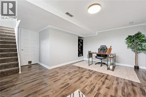Wood-finish flooring, recessed shelving, and a flush-mount ceiling light - 308 Parkvale Drive, Kitchener, ON - Indoor