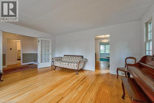 Hardwood flooring throughout, white painted walls, and white trim - 321 Highland Park, Cambridge, ON 