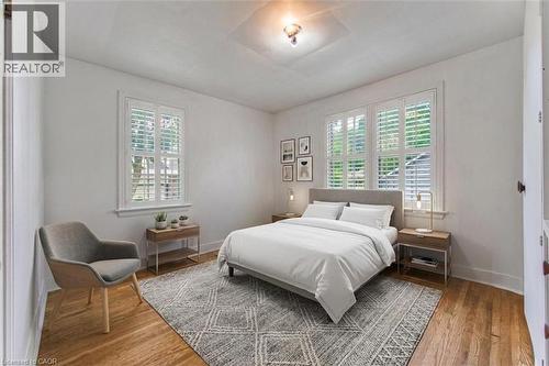 Hardwood flooring, plantation shutters, recessed lighting, and a neutral color palette - 321 Highland Park, Cambridge, ON 