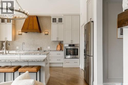 107 Mahabir Crescent, Saskatoon, SK - Indoor Photo Showing Kitchen With Stainless Steel Kitchen With Upgraded Kitchen