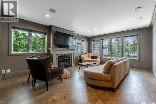 107 Mahabir Crescent, Saskatoon, SK - Indoor Photo Showing Living Room With Fireplace