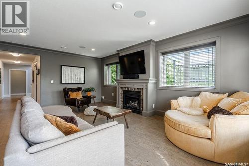 107 Mahabir Crescent, Saskatoon, SK - Indoor Photo Showing Living Room With Fireplace
