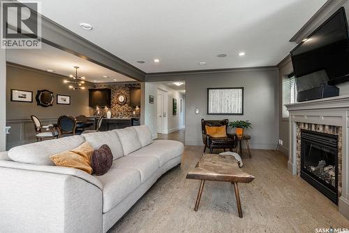 107 Mahabir Crescent, Saskatoon, SK - Indoor Photo Showing Living Room With Fireplace