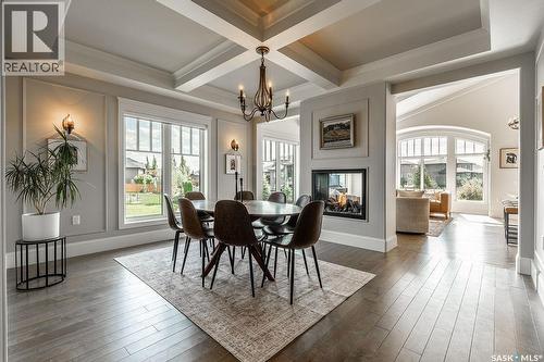 107 Mahabir Crescent, Saskatoon, SK - Indoor Photo Showing Dining Room With Fireplace
