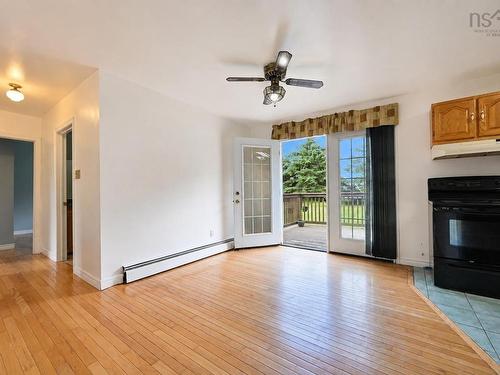 365 Johnson Rd, Georges River, NS - Indoor Photo Showing Living Room With Fireplace