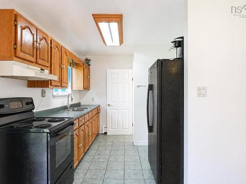 365 Johnson Rd, Georges River, NS - Indoor Photo Showing Kitchen With Double Sink