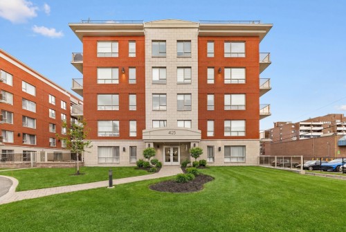 Front of Structure - 507-4125 Boul. St-Jean, Dollard-Des-Ormeaux, QC - Outdoor With Facade