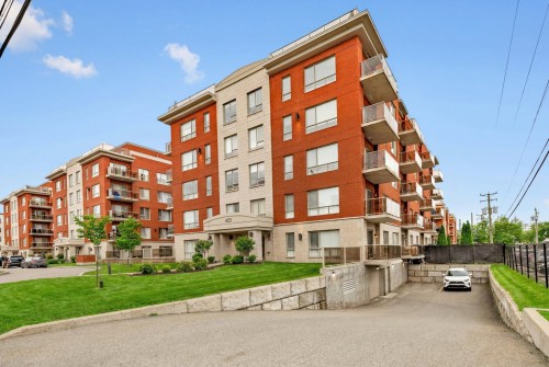 Front of Structure - 507-4125 Boul. St-Jean, Dollard-Des-Ormeaux, QC - Outdoor With Facade
