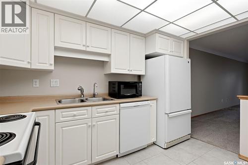 210 2550 25Th Avenue, Regina, SK - Indoor Photo Showing Kitchen With Double Sink