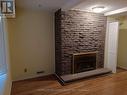 2475 Council Ring Road, Mississauga, ON  - Indoor Photo Showing Living Room With Fireplace 