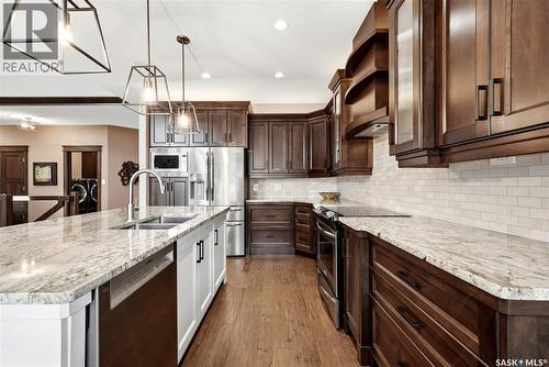 3902 Goldfinch Way, Regina, SK - Indoor Photo Showing Kitchen With Double Sink With Upgraded Kitchen