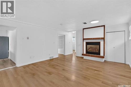 738 Weldon Avenue, Saskatoon, SK - Indoor Photo Showing Living Room With Fireplace