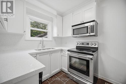 36 Rushley Drive, Toronto, ON - Indoor Photo Showing Kitchen With Double Sink