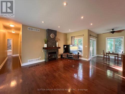 32 Albion Lane, Tiny, ON - Indoor With Fireplace