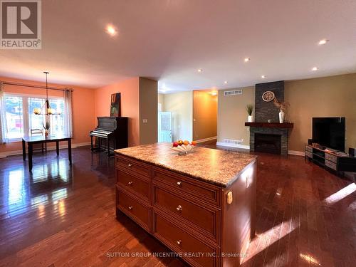 32 Albion Lane, Tiny, ON - Indoor Photo Showing Living Room With Fireplace