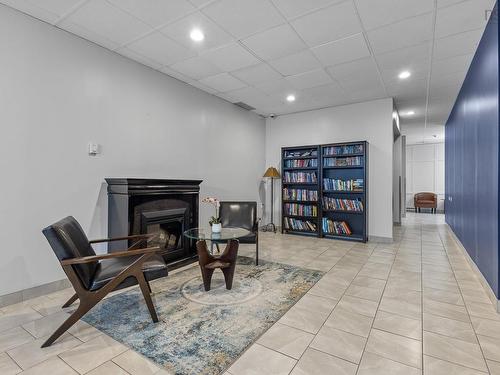 1002 5572 North Ridge Road, Halifax, NS - Indoor Photo Showing Other Room With Fireplace