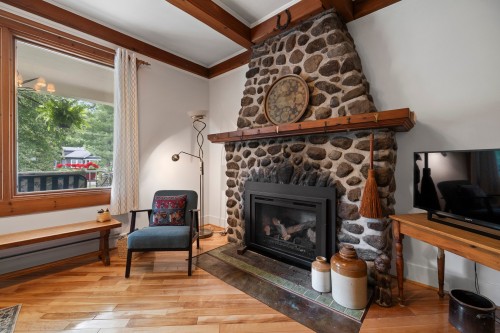 Salon - 26 Av. Cedar, Pointe-Claire, QC - Indoor Photo Showing Living Room With Fireplace
