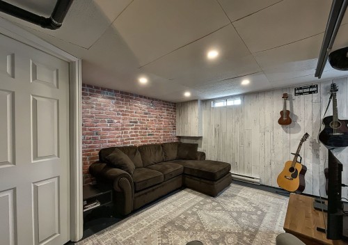 Family Room - 120 Rue St-Joachim, L'Assomption, QC - Indoor Photo Showing Basement