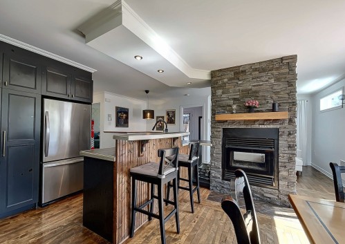Kitchen - 120 Rue St-Joachim, L'Assomption, QC - Indoor With Fireplace