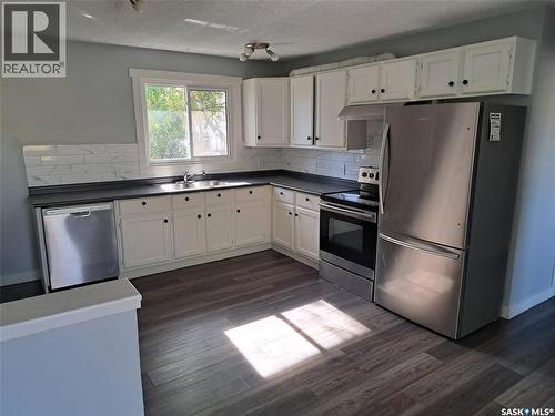 3629 Centennial Drive, Saskatoon, SK - Indoor Photo Showing Kitchen With Double Sink