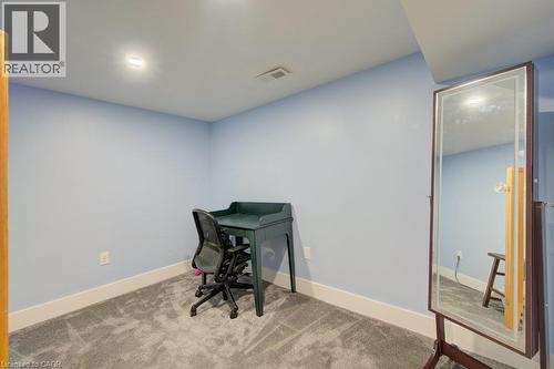 Recessed ceiling lighting, light blue wall paint, and gray carpeting - 97 Francis Street, Cambridge, ON - Indoor