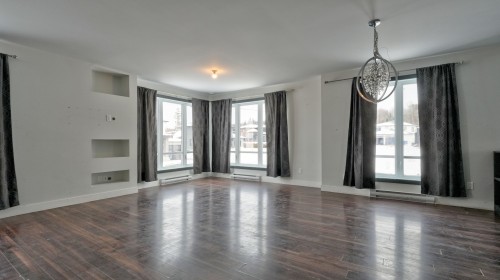 Salon - 531 Av. Du Jade, Sainte-Marie, QC - Indoor Photo Showing Other Room With Fireplace
