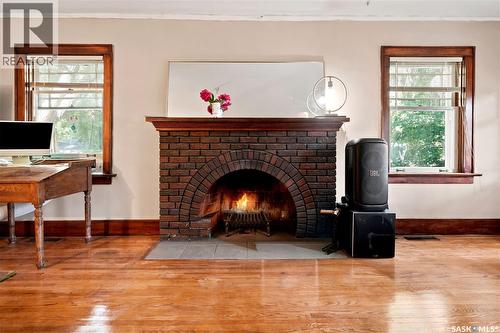 3300 Victoria Avenue, Regina, SK - Indoor Photo Showing Living Room With Fireplace