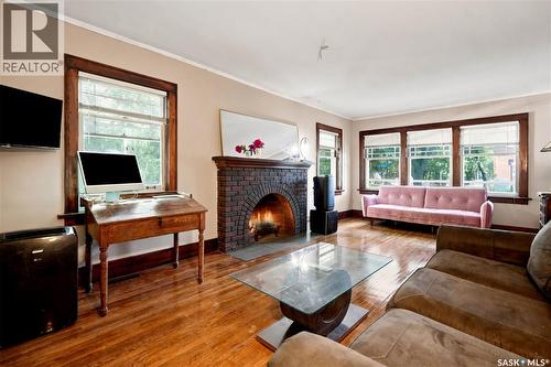 3300 Victoria Avenue, Regina, SK - Indoor Photo Showing Living Room With Fireplace