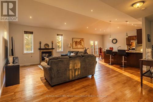 122 Trout Lane, Tiny, ON - Indoor Photo Showing Living Room With Fireplace