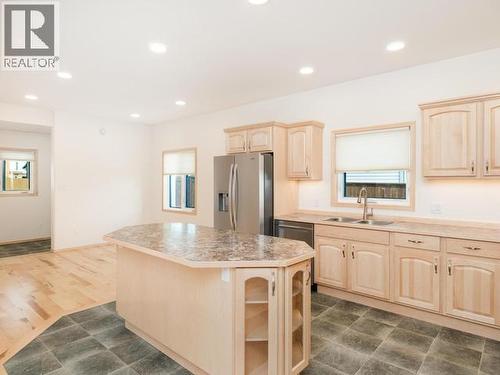 20 Quick Street, Whitehorse, YT - Indoor Photo Showing Kitchen With Double Sink