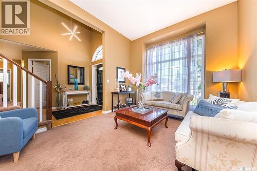 114 Mcfarland Place, Saskatoon, SK - Indoor Photo Showing Living Room With Fireplace